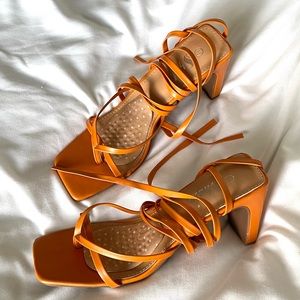 Orange strappy heels